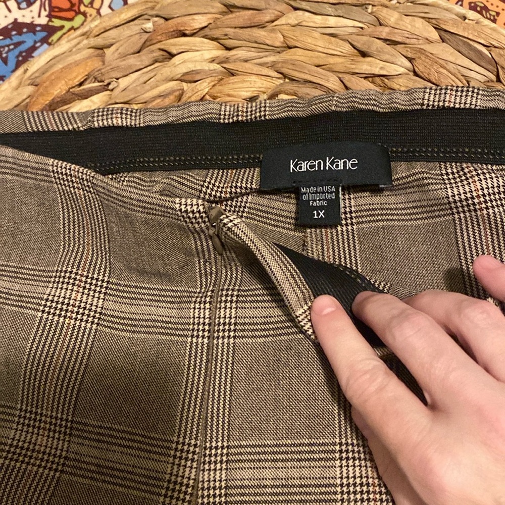 Karen Kane polished plaid pants gently worn in a plaid pattern.